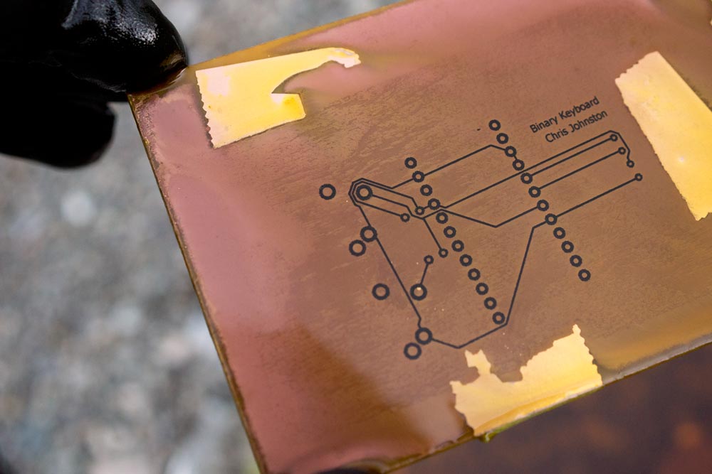 Image of copper board being etched away